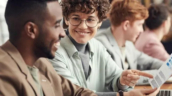 Free-to-use photo by Fauxels from Pexel Illustration: photo of employees working together